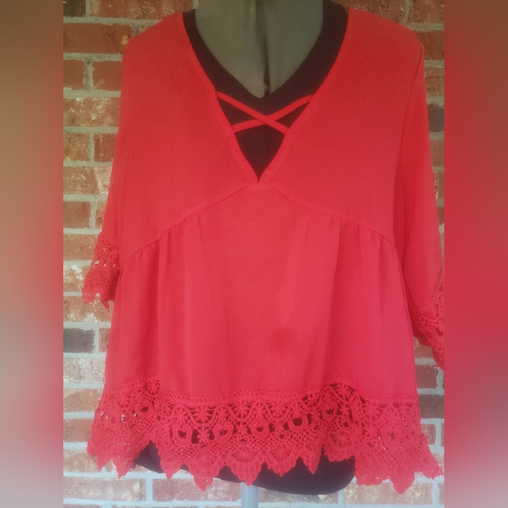 Red,lace trimed,shorter front longer back, sheen tank with criss cross design.